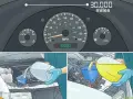 Learn how to flush radiator fluid at 30,000 miles. The image shows a car dashboard and someone adding fluid to the engine.