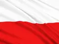 Flaga Polski z białym pasem na górze i czerwonym na dole, lekko pofalowana. Odwrócona flaga polski, symbol dumy narodowej.