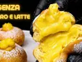 Bomboloni alla crema, soffici e ripieni, senza burro e latte. Un'esplosione di dolcezza.