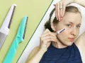 Dermaplaning for men: A woman uses a facial razor, similar to those used for dermaplaning, to exfoliate her skin.