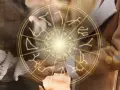 Koło zodiaku z symbolami gwiazd. Zastanawiasz się, jaki znak zodiaku pasuje do Ryby?