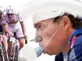 Cyclists training to improve their cycling VO2 max, with one wearing a mask for testing.