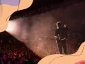 Ein Musiker steht auf einer Bühne, die Menge jubelt. Ein Traum, Musiker zu werden, wird hier lebendig.