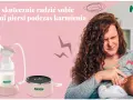 Kobieta z bólem piersi podczas karmienia piersią. Obok laktator Neno, który może pomóc złagodzić dyskomfort.