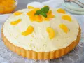 Eine Tarte mit cremiger Füllung und Mandarinenstücken. Man kann Paradiescreme backen, diese Tarte ist ein Beweis dafür!