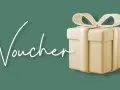 Elegancki prezent z napisem "Voucher" i wstążką. Idealny na relaks w Termach Chochołowskich.