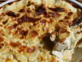 Un gratin dauphinois onctueux et doré, prêt à être dégusté. Un délice préparé avec le Cookeo.
