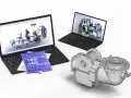 Dwa laptopy z wizualizacjami 3D mechanizmów, niebieskie plany i model części. To efekt pracy z programem cad skrót.