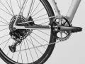 Close-up of a modern MTB drivetrain, featuring a SRAM rear derailleur, a wide-range cassette, and a single-chainring crankset.