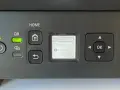 Drukarka Canon TS3150. Zielona kontrolka QR świeci, a na ekranie widoczny jest komunikat "Bezpośr. tryb b...".