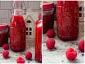 Himbeer Schnaps selber machen: Flaschen gefüllt mit rotem Likör, frische Himbeeren und ein kleines weißes Haus.