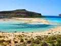 Balos Lagoon, Crete, Greece: turquoise waters, sandy beaches, and a dramatic island backdrop make this the best island in Greece for a perfect beach day.