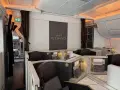 Luksusowe fotele w klasie biznes Etihad Airways. Pozytywne etihad airways opinie potwierdza ten widok.