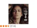 Jennifer Lopez w okładce albumu "This Is Me... Now". Gwiazda z burzą brązowych włosów, zmysłowym spojrzeniem i napisem "This Is Me... Now".
