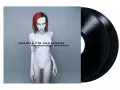 Pochette de l'album "Mechanical Animals" de Marilyn Manson, avec deux vinyles noirs. L'image évoque des créatures mécaniques.