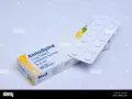 Confezione di Amlodipina 5 mg, 28 compresse per uso orale, con blister e foglietto illustrativo.