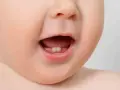 Malutkie ząbki dziecka, pierwsze oznaki ząbkowania kiedy.