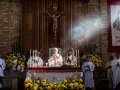 Clergy at an altar during a religious service. The length of vigils can vary, but this scene captures a moment of solemnity.