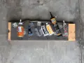 Adhesives are laid out on a board, including Gorilla Poly, Loctite, and Gorilla Clear, to test if Gorilla Glue works on resin.