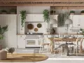 Cucina luminosa con mobili chiari, tante piante e un tavolo in legno. Un'atmosfera country chic rilassante.