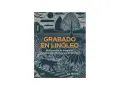 Portada de libro "Grabado en linóleo", con un diseño detallado de linograbado que incluye un gato, flores, un árbol y una casa.
