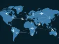 World map with flight paths connecting continents. Discover the best time to book international flights to Europe for your next adventure.
