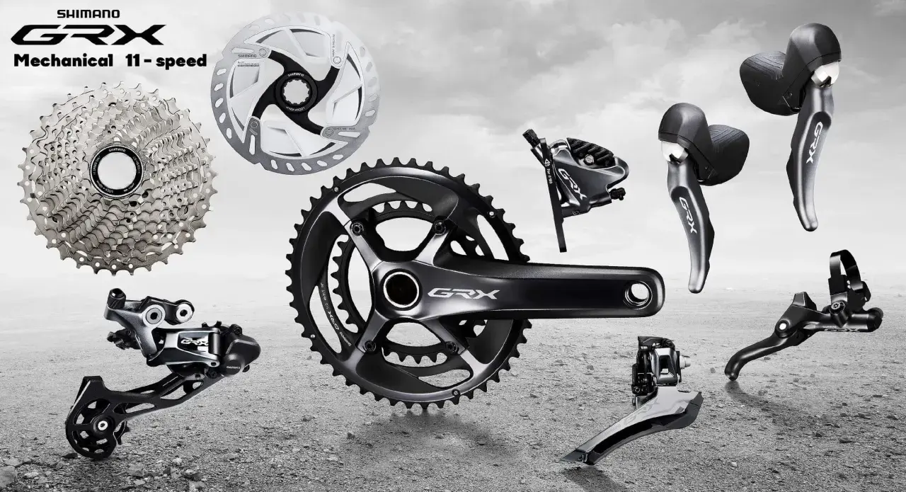 Komponenty rowerowe Shimano GRX: kaseta, korba, przerzutki, hamulce i manetki. Idealne do gravelowych wypraw.