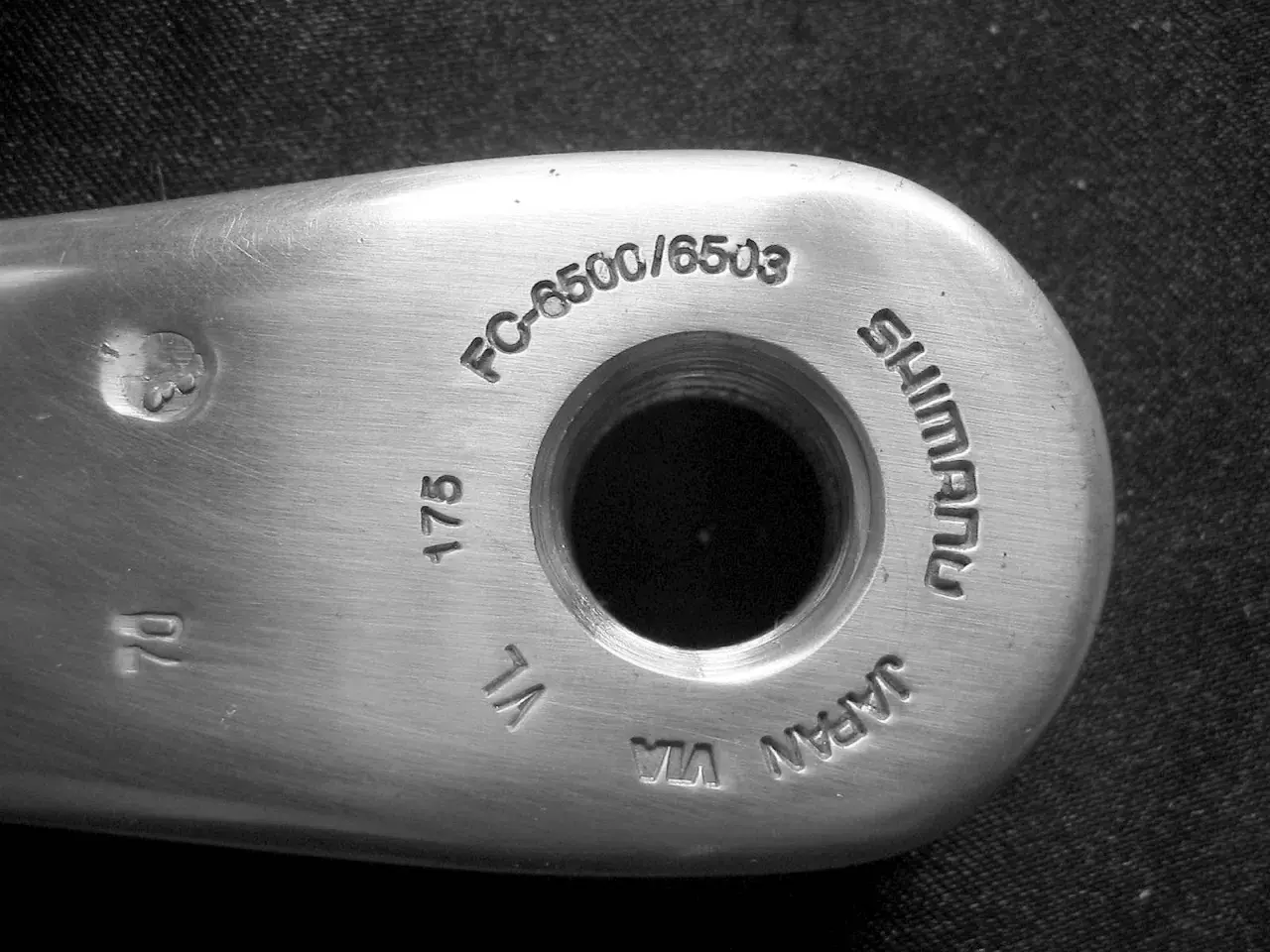 Oznaczenia kołowrotków Shimano: FC-6500/6503, 175, VL, VIA, JAPAN.