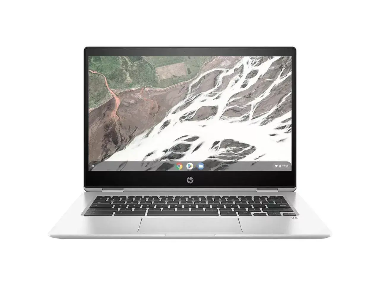 Srebrny laptop HP z systemem **Chromium OS** i klawiaturą. Na ekranie widok z lotu ptaka na krajobraz.