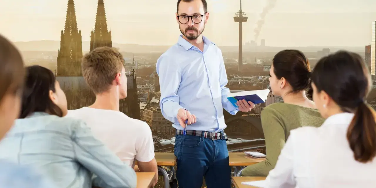 Nauczyciel w niemieckiej szkole, gdzie polskie dziecko bez znajomości języka próbuje zrozumieć lekcję.