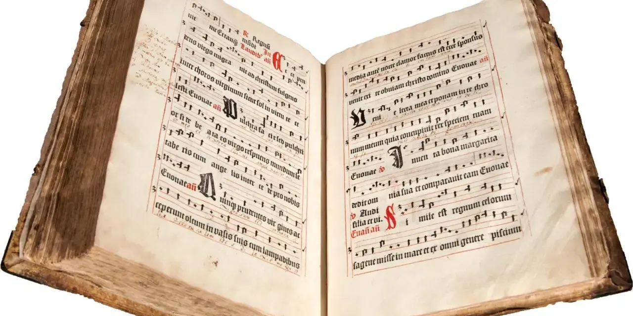 An ancient illuminated manuscript, its pages filled with musical notation and text, evokes the divine hours.