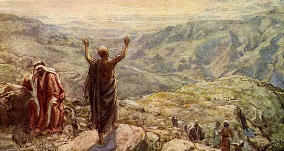 Balaam in the Bible, with arms raised, blesses Israel from a mountaintop. Another man in red looks on.