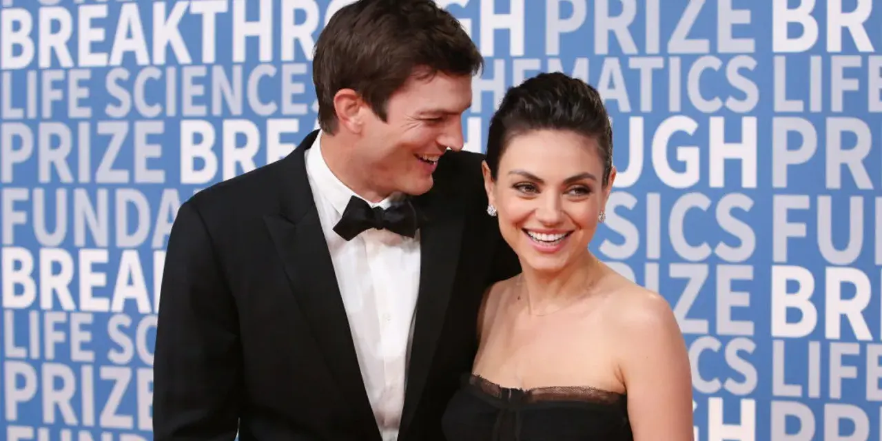 Ashton Kutcher i Mila Kunis, niczym dwa skorpiony, błyszczą na czerwonym dywanie.