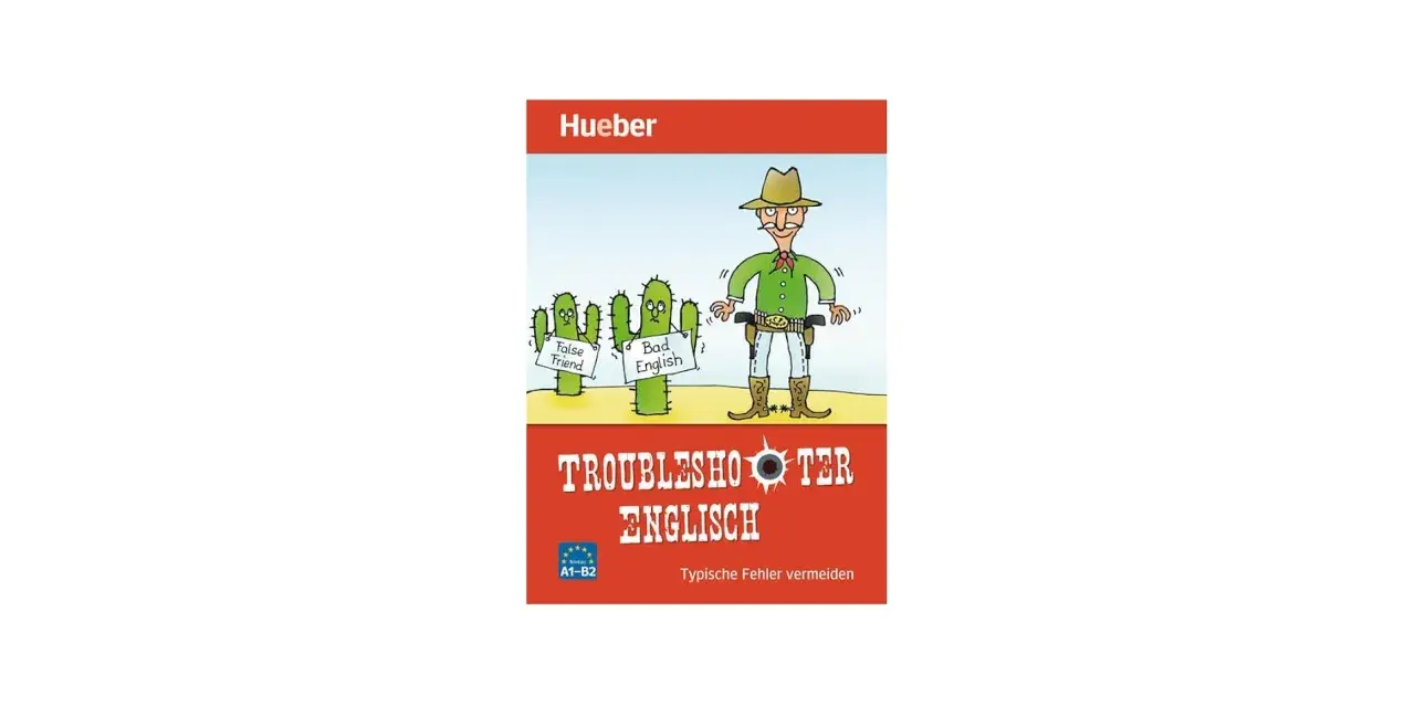Ein Cowboy mit zwei Kakteen, die "False Friend" und "Bad English" tragen. Das Buch "Troubleshooter Englisch" hilft, typische Fehler zu vermeiden, wie sie im passiven Infinitiv vorkommen können.