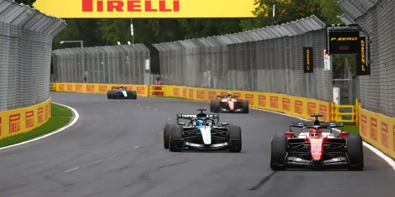 Coches de F1 compiten en una pista, con el logo de Pirelli al fondo. ¡Noticias de F1!