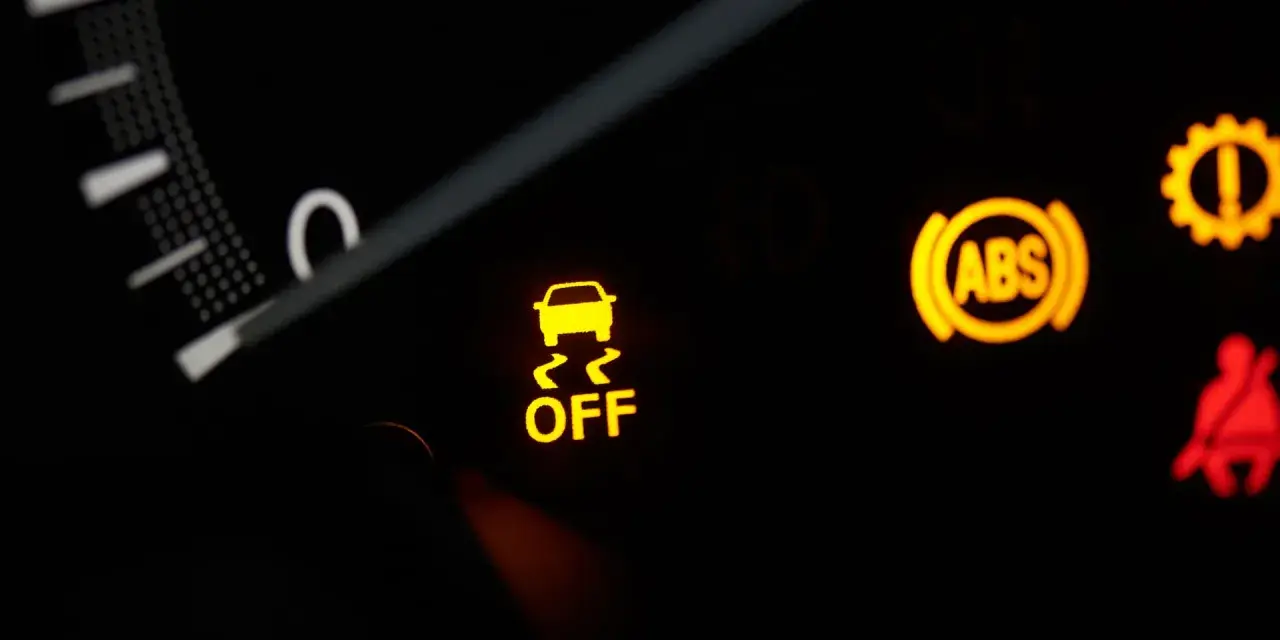 Dashboard lights show the ESC system is OFF, alongside ABS and seatbelt warnings.