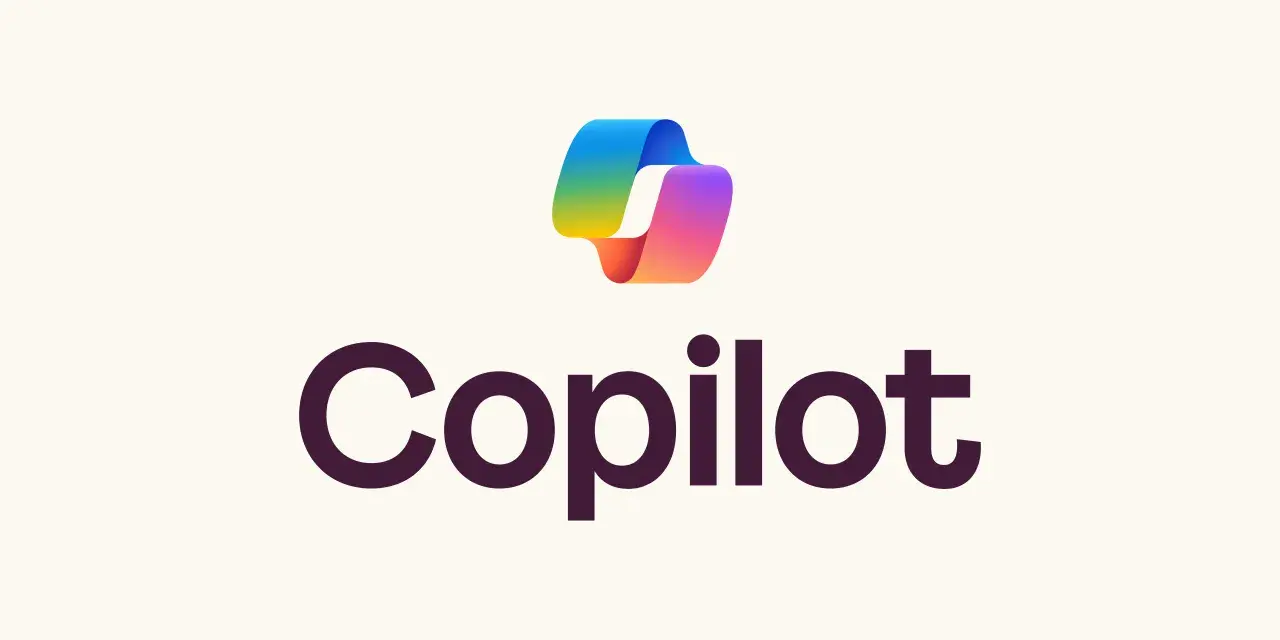 Logo Copilot: tęczowa wstążka i nazwa marki.