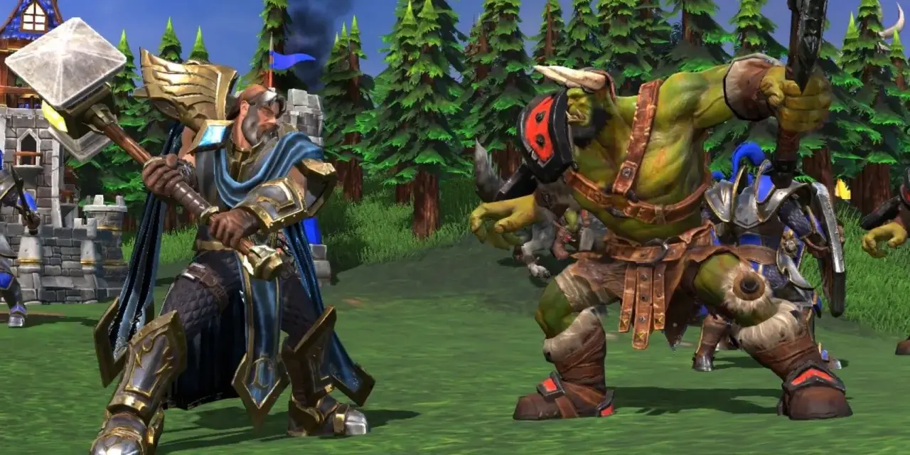 Rycerz z młotem i zielonoskóry ork szykują się do walki. Czyżby szukali kodów do Warcraft 3?