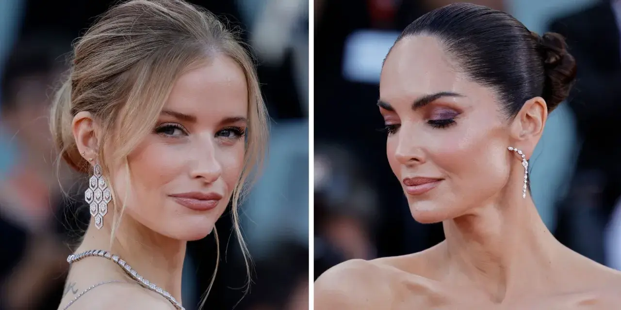 Due donne con acconciature eleganti: una con uno chignon morbido con ciuffo e l'altra con uno chignon basso.