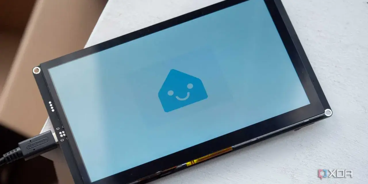 A screen displays the Home Assistant logo, ready for ESPHome Zigbee integration.