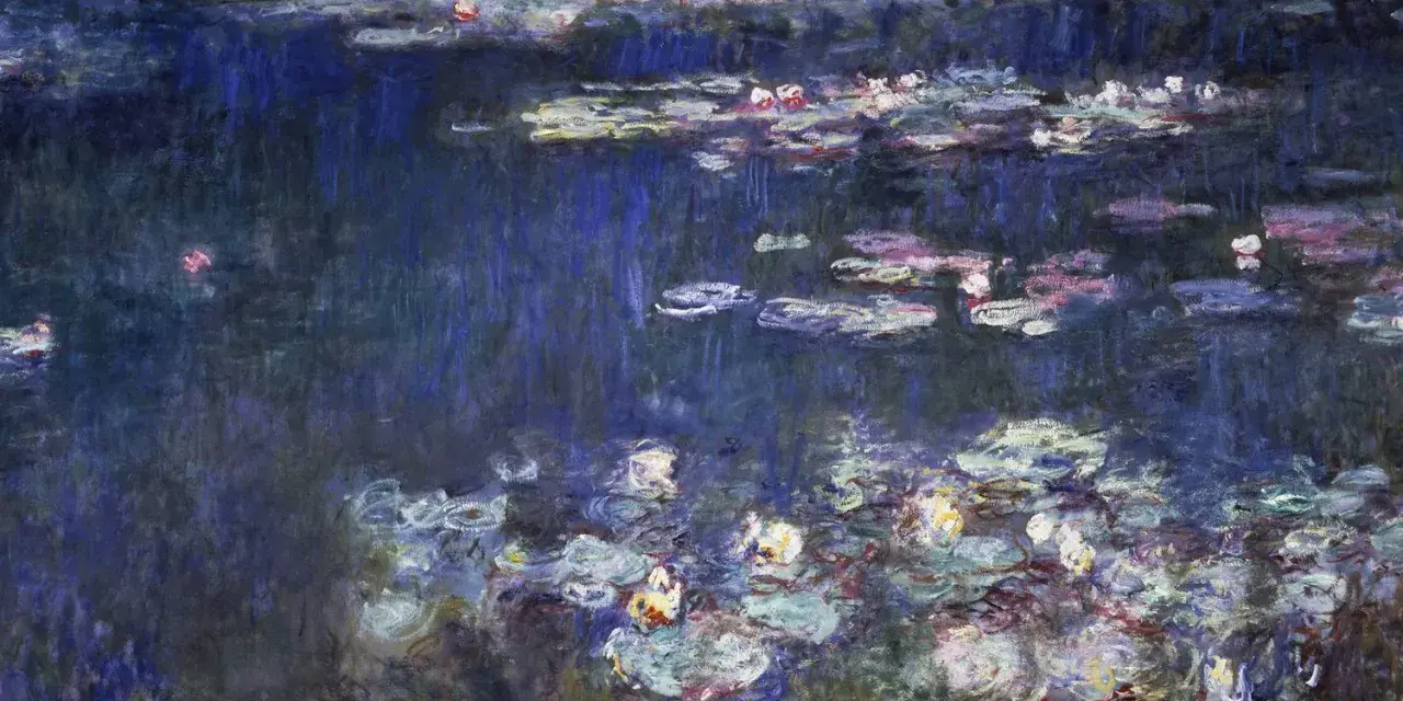 Un étang de nénuphars aux reflets bleus et roses, une œuvre emblématique de Claude Monet, baignée d'une lumière impressionniste.