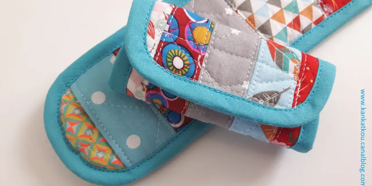 Idée couture : tissu matelassé aux motifs géométriques et floraux, bordé de biais turquoise. Parfait pour un manique ou un dessous de plat original.