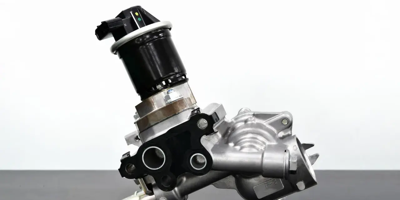 A car's EGR valve, a component that can cause bad EGR valve symptoms if faulty.
