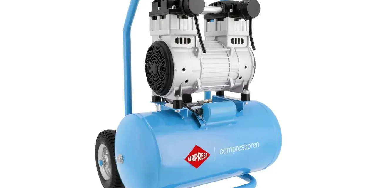 Niebieski kompresor z uchwytem i kółkami. Logo AIRPRESS i napis "compressoren" sugerują, że to firma produkująca sprężarki.