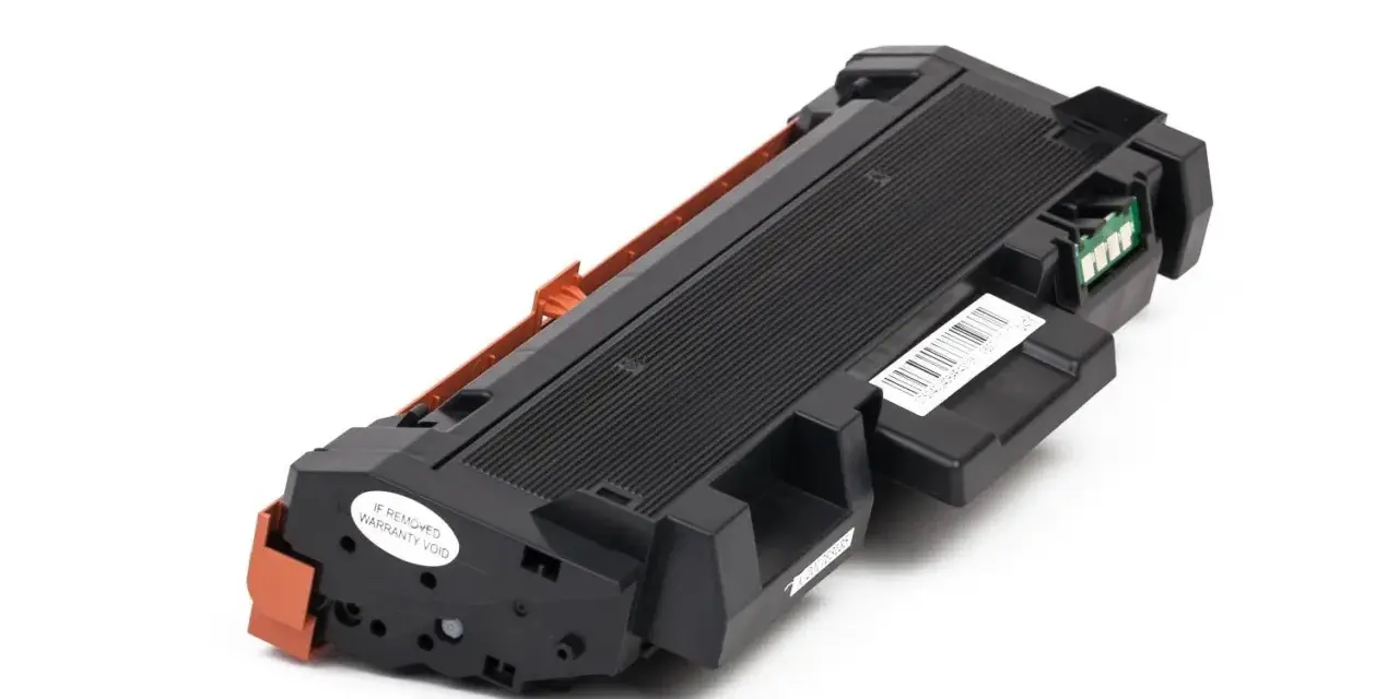 Toner do drukarki Xerox Phaser 3052, czarny, z pomarańczowymi elementami i naklejką gwarancyjną.