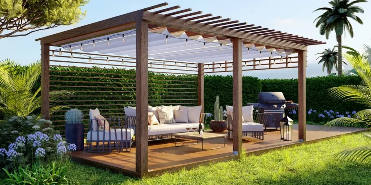 Pergola de madera con muebles cómodos, parrilla y luces, ideal para disfrutar del exterior.