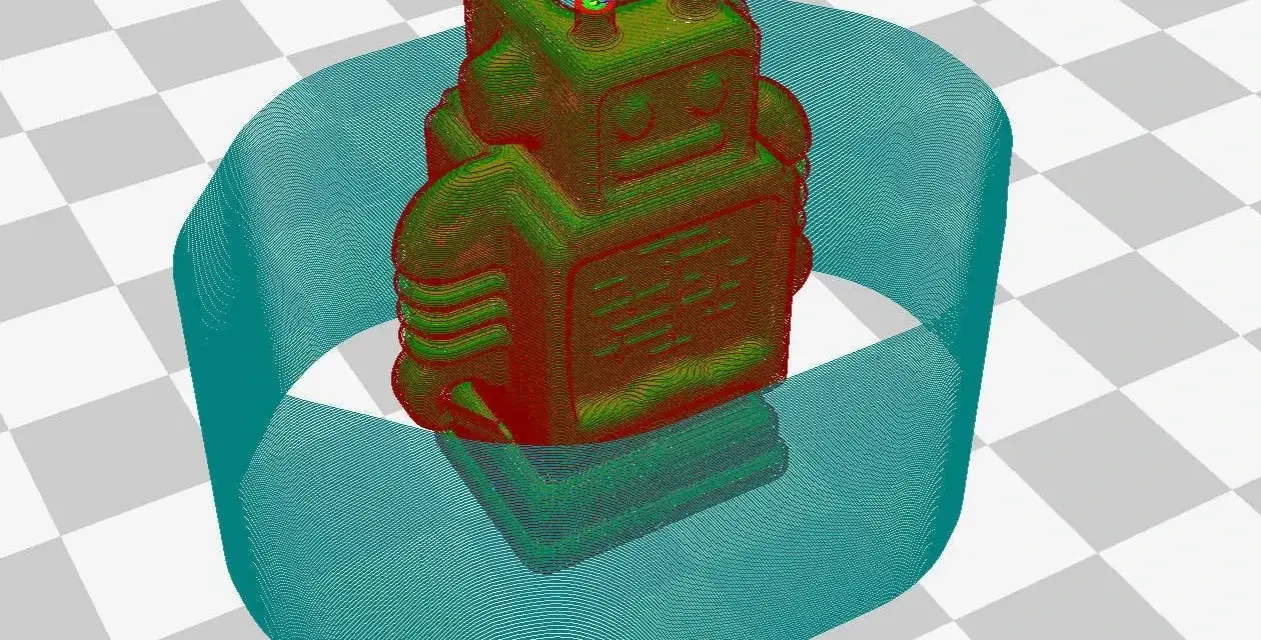 Model robota na drukarce 3D, otoczony niebieską obwódką. To pokazuje, co to adhezja, czyli przyczepność wydruku do stołu.