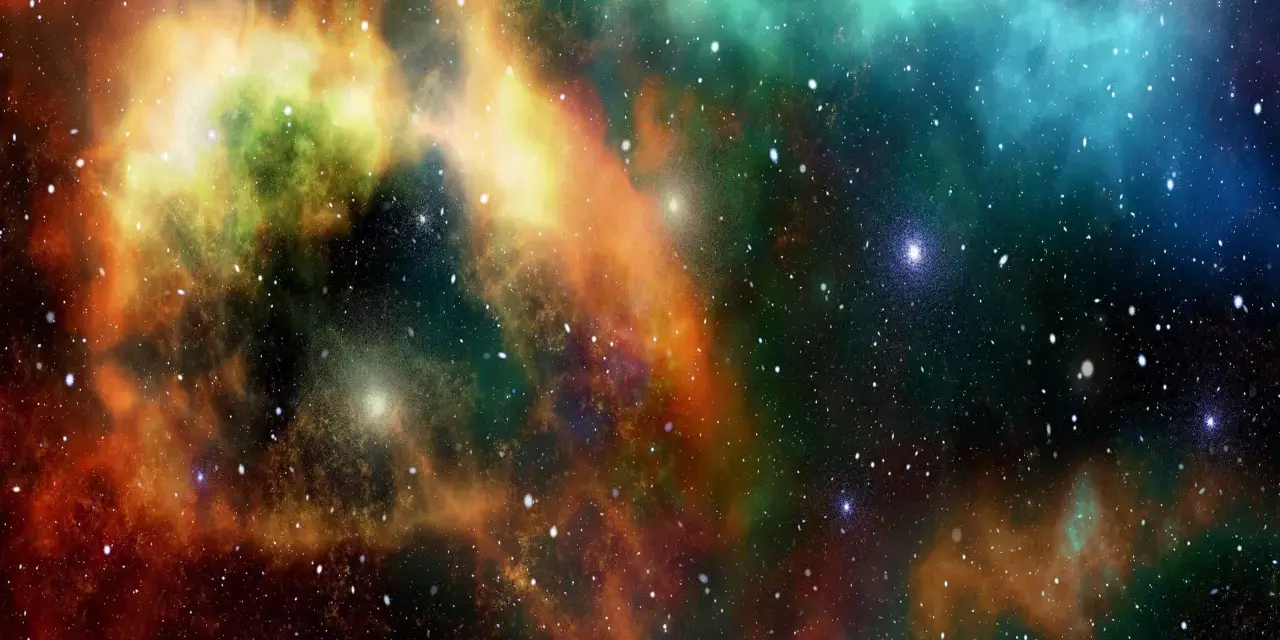 Nebulosa cosmica con sfumature arancioni, verdi e blu. Un universo di stelle che ispira la ricerca e gli sbocchi lavorativi in astrofisica.