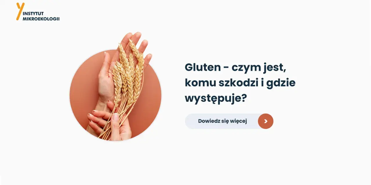 Dłonie trzymające kłosy zboża na tle okręgu.