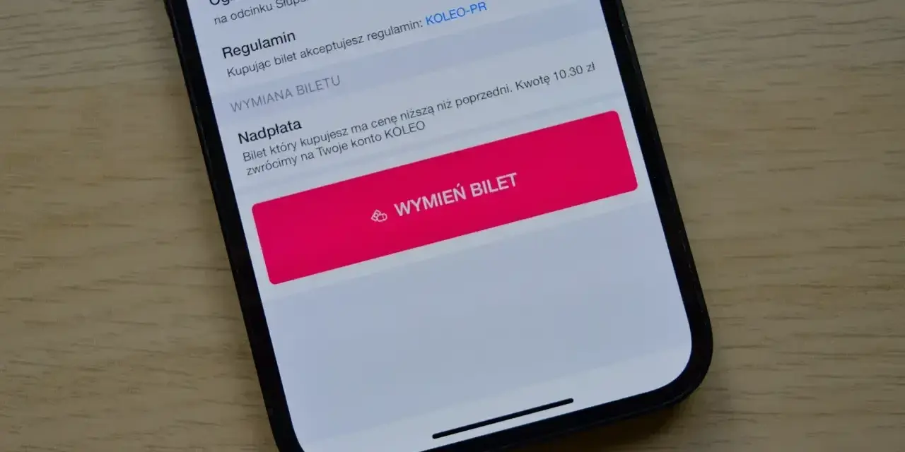Ekran telefonu z aplikacją Koleo, przycisk "Wymień bilet" i informacja o nadpłacie.